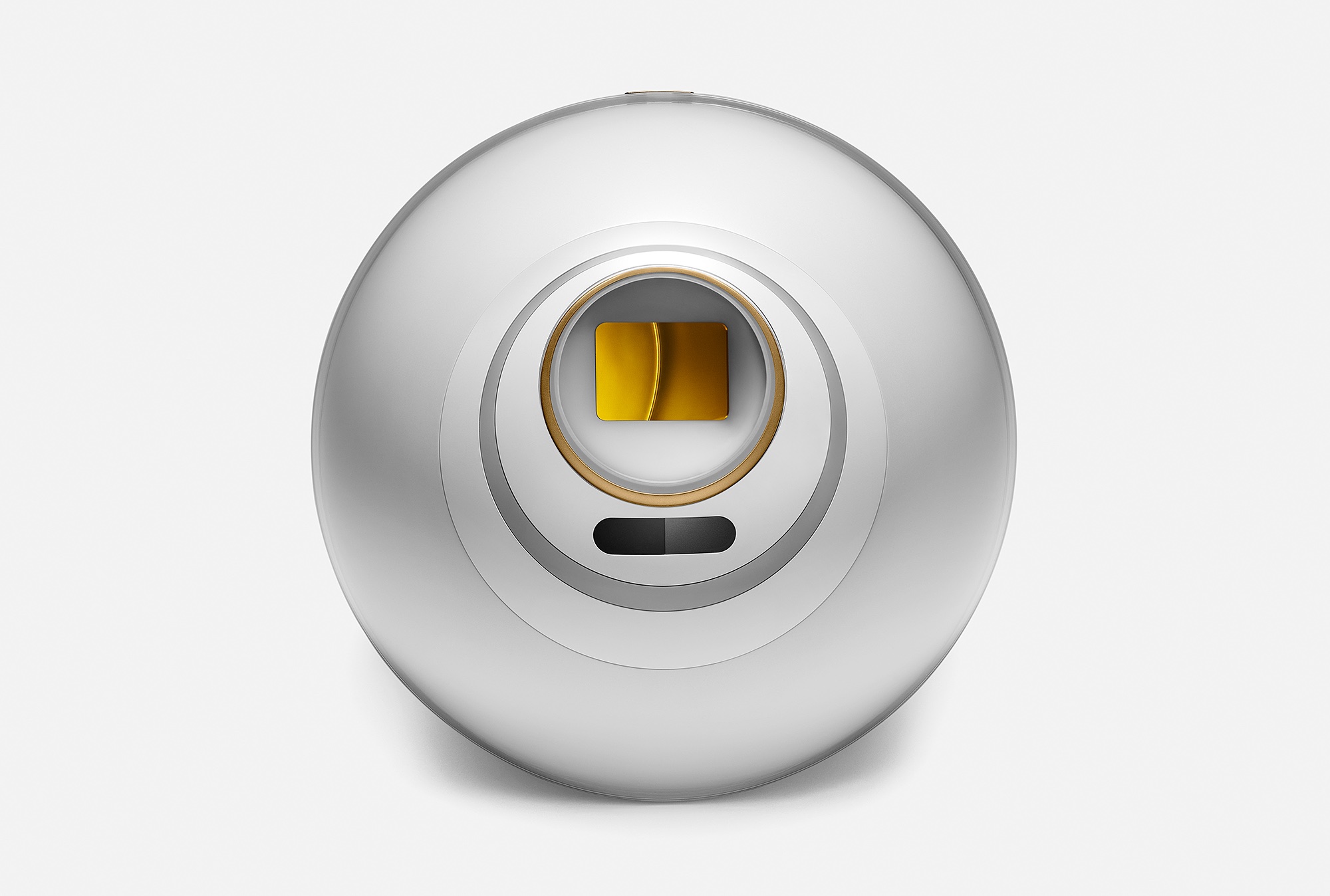 Close-up view of the Orb, silver and spherical with a central verification slot.