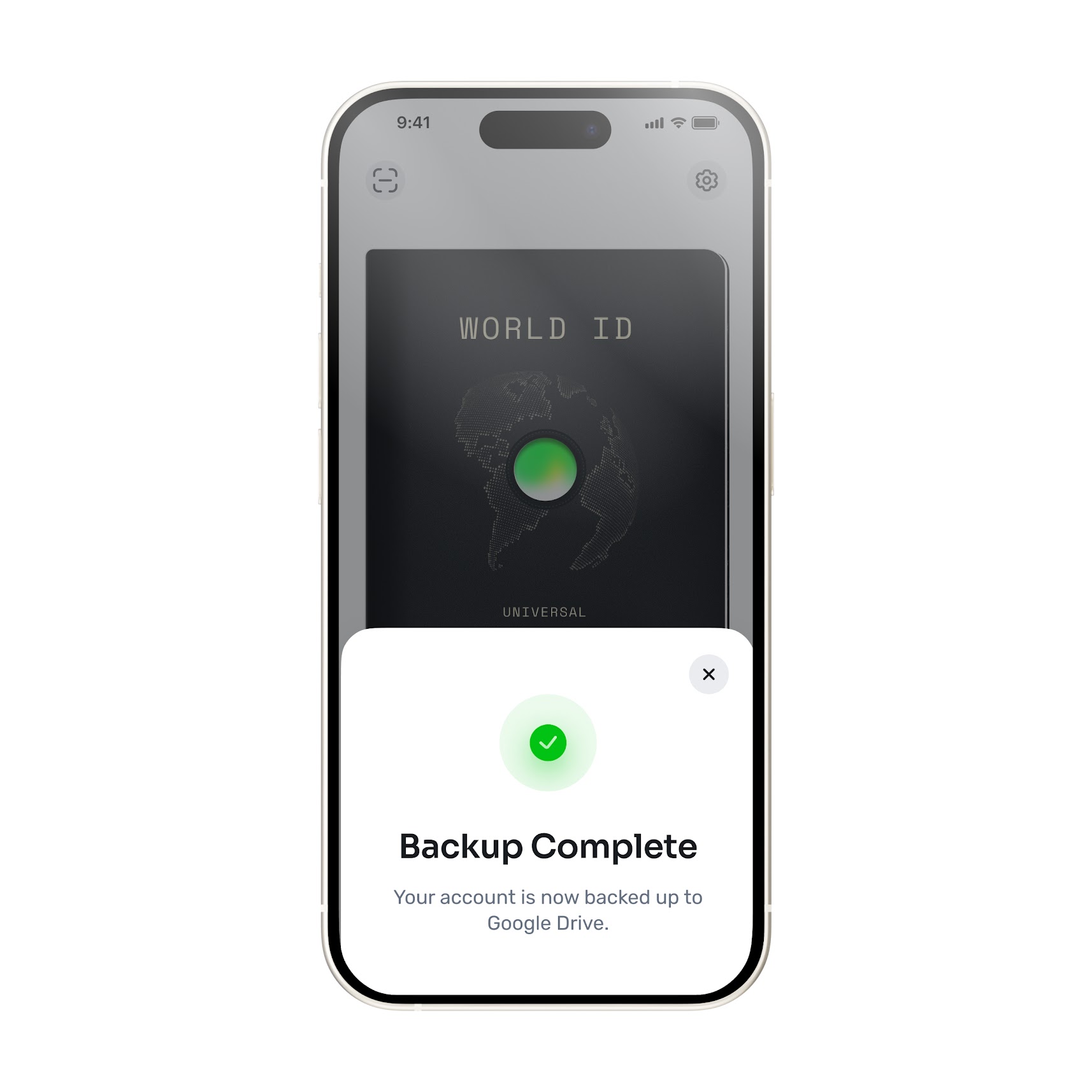 Screenshot of the World App showing a backup completion message, confirming the account is backed up to Google Drive.