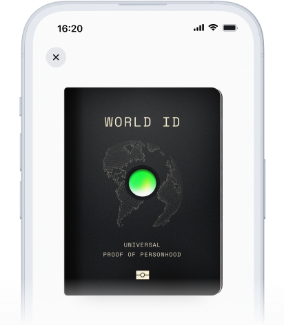 A mobile screen displaying the World ID card with a green verification light, representing proof of personhood.