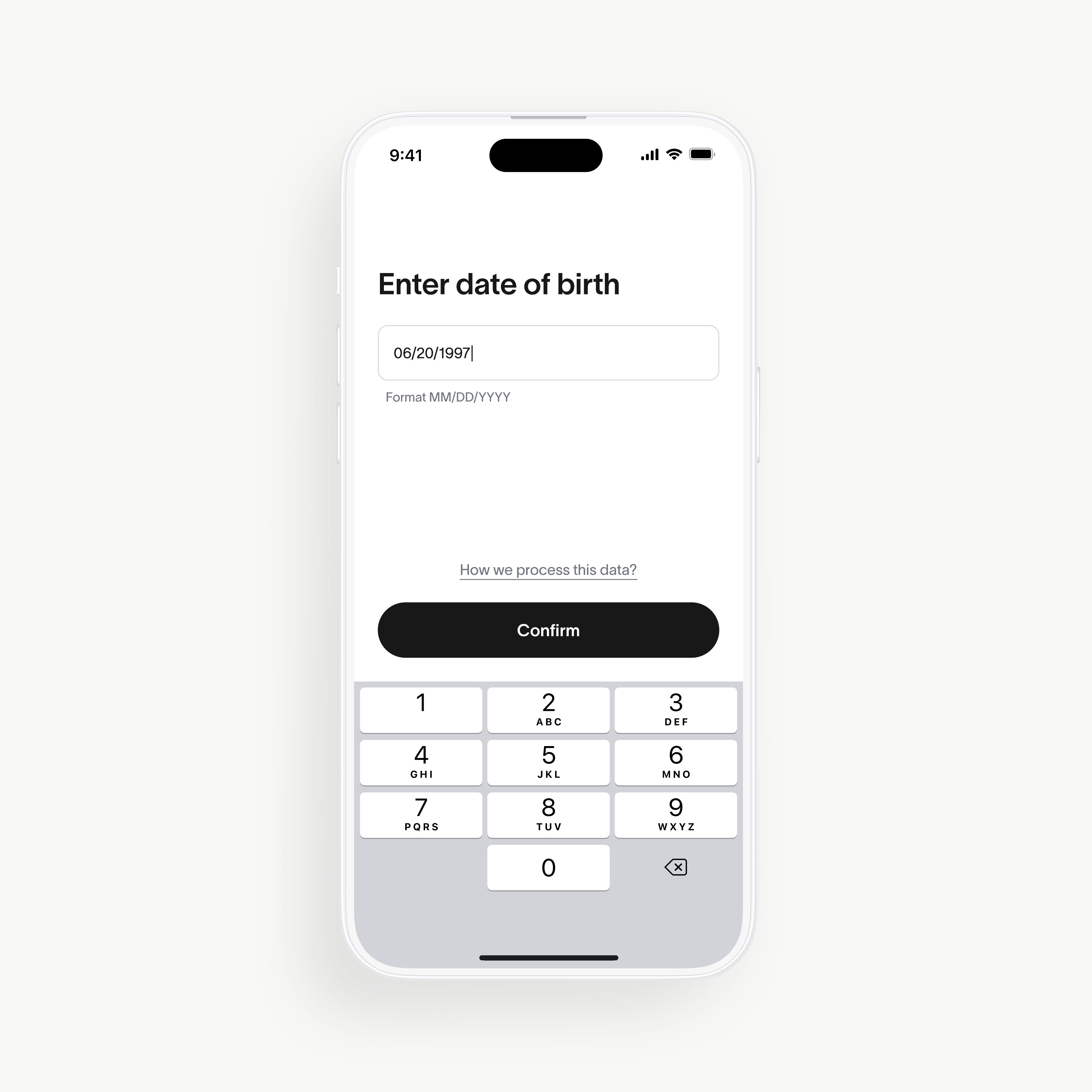 Screenshot of the World App input screen for entering date of birth, with a numeric keypad below.