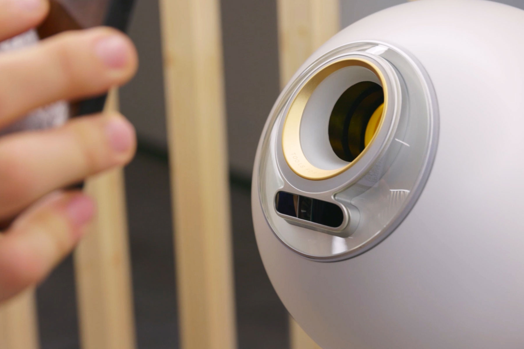 Close-up of an Orb used for biometric verification, showcasing its sensor and sleek design.