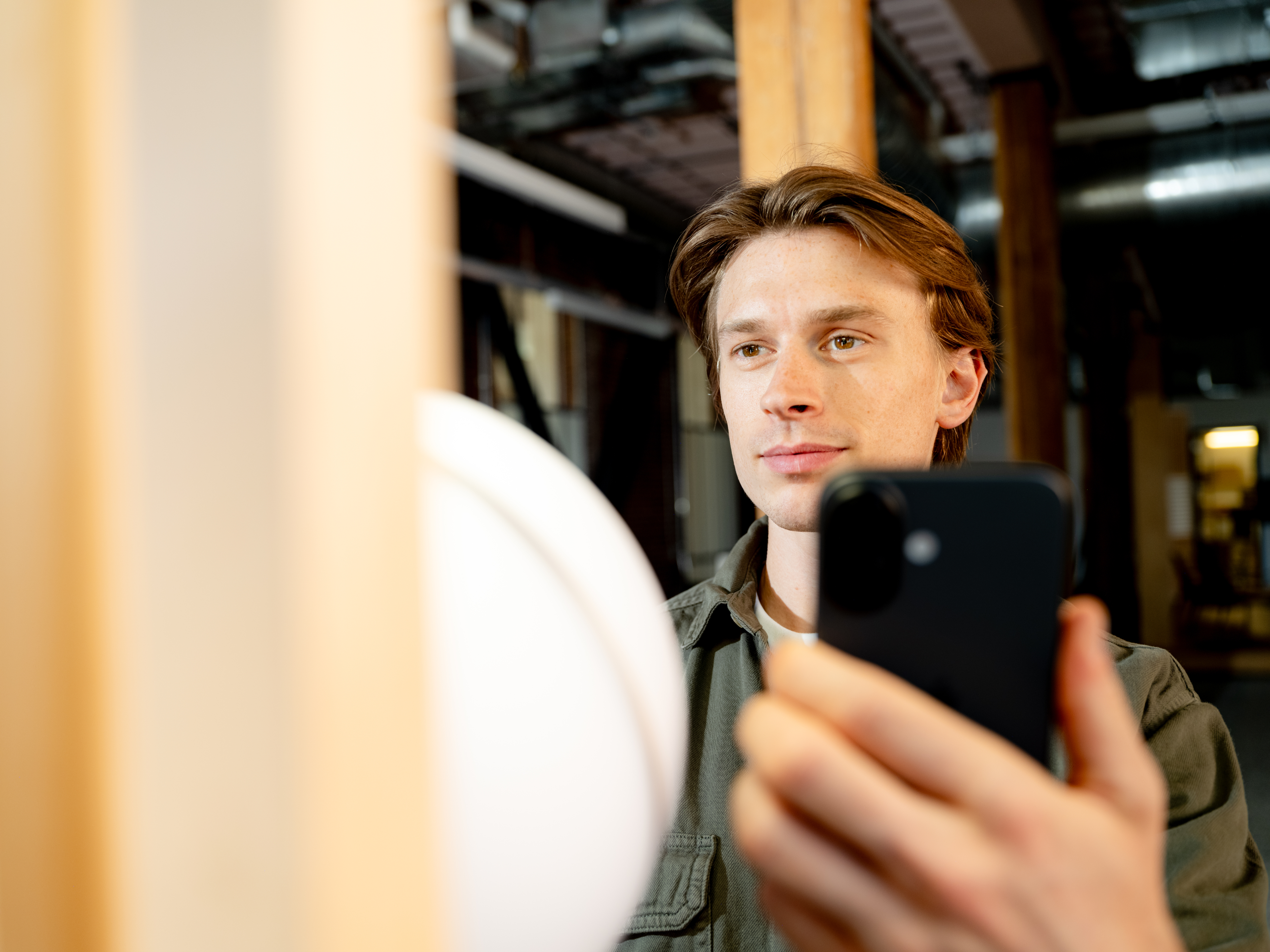 A person verifying their World ID at an Orb